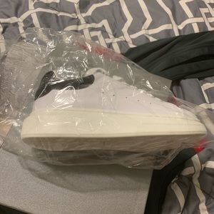 Alexander McQueen size 44 (US 11)